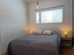 En eller flere senge i et værelse på Loikua