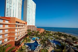 a view of a resort with a pool and a beach at Grand Fiesta Americana Veracruz in Veracruz +150 photos