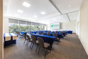a conference room with blue tables and chairs at Gamma Ciudad de Mexico Santa Fe in Mexico City