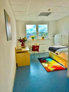 Kuchyň nebo kuchyňský kout v ubytování Donau-Iller Vermietung 24 GmbH