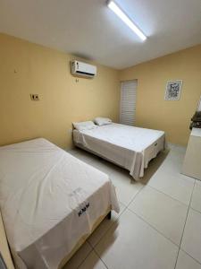 Postel nebo postele na pokoji v ubytování Casa Brisas + 10 fotografií