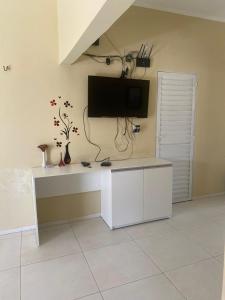 TV a/nebo společenská místnost v ubytování Casa Brisas