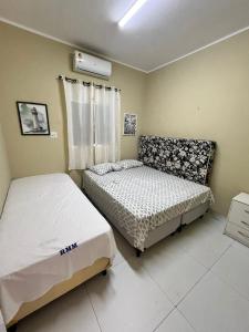 Postel nebo postele na pokoji v ubytování Casa Brisas