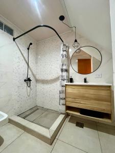 a bathroom with a sink and a mirror at APART TRAVEL SUITES, modernos departamentos -15 min Aerop EZE in Monte Grande +46 photos