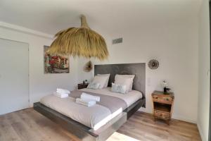Postel nebo postele na pokoji v ubytování Villa d'exception à Mauguio + 28 fotografií