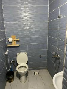 a bathroom with a toilet and a sink at Mountain view House in Dahab
