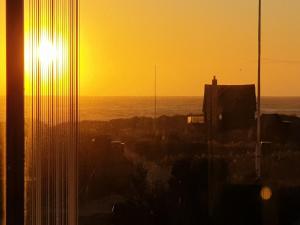 Bình minh/hoàng hôn nhìn từ nhà nghỉ dưỡng  hoặc gần đó