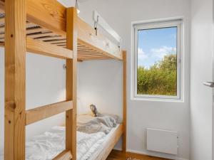 Giường trong phòng chung tại Holiday Home Tekla - 180m from the sea by Interhome +18 ảnh