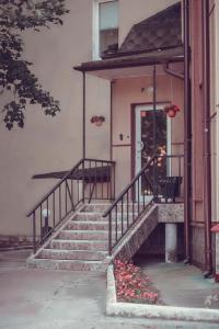 a set of stairs in front of a house at MDK Hotel in Saint Petersburg