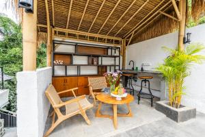 Αίθριο ή υπαίθριος χώρος στο Sacred Jungle by EVDEkimi - Stylish Jungle Retreat with Apartments & Villas with Kitchens, Pools and Concierge Service in Ubud