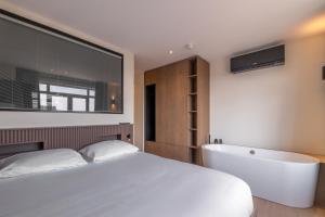 Postel nebo postele na pokoji v ubytování Four Stories