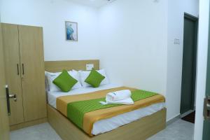 Кровать или кровати в номере 3 BHK Homestay Near CHENNAI AIRPORT