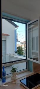 a window in a room with a view of a balcony at coralinehome in Castellammare di Stabia