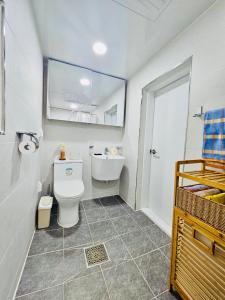 a bathroom with a toilet and a sink at 후암가옥 in Seoul +55 photos