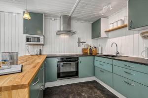 Η κουζίνα ή μικρή κουζίνα στο C11744-Hemmet-Vagtelvaenget-22 +25 φωτογραφίες