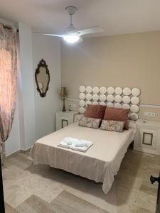 Giường trong phòng chung tại Vivienda al Sur del Sur