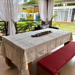 a table with a white table cloth on it at Villa Valber in Aga