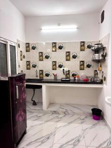 Kuchyň nebo kuchyňský kout v ubytování Villa Blossom