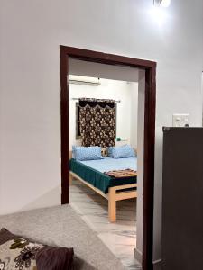 Postel nebo postele na pokoji v ubytování Villa Blossom