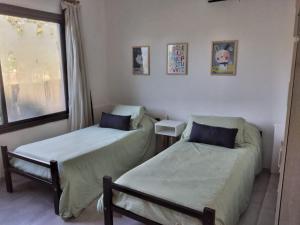 Ένα ή περισσότερα κρεβάτια σε δωμάτιο στο Sol & Río Refugio Serrano