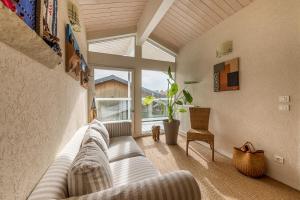 Χώρος καθιστικού στο Maison Lacustre - Maison contemporaine avec vue panoramique sur le lac d'Annecy +10 φωτογραφίες