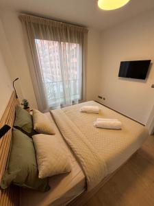 Postel nebo postele na pokoji v ubytování App Dichtbij vliegveld, Madrid centrum en IFEMA