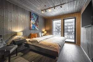 Postel nebo postele na pokoji v ubytování Ski out ski in Luxus Hemsedal + 61 fotografií