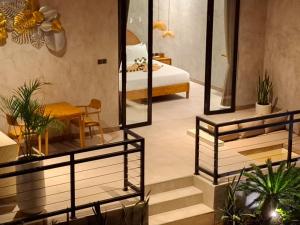 Una cama o camas en una habitación de Bella Vida Resort 27 fotos más