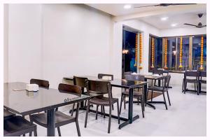 Εστιατόριο ή άλλο μέρος για φαγητό στο Hotel Daivika Residency Near Vishwanath Temple