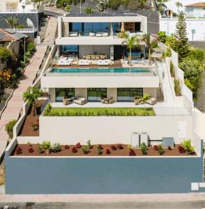 an aerial view of a house with a swimming pool at Villa Kailani in Adeje