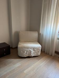 Postel nebo postele na pokoji v ubytování La Kasina al Porto