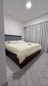 a bedroom with a large bed in a room at ازور in Aqaba +12 photos
