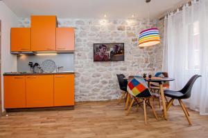 Kuchyň nebo kuchyňský kout v ubytování Carera Deluxe Rovinj
