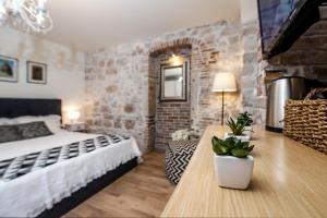 Postel nebo postele na pokoji v ubytování Carera Deluxe Rovinj