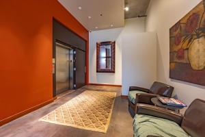 a living room with a couch and a table at Doppio Perch condo in Hood River +16 photos