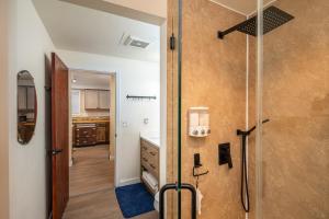 a bathroom with a shower and a sink at Cozy 3-Bedroom Townhome - 3 Miles from OSU! in Corvallis +52 photos