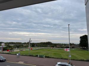 a park with a baseball field in a city at Sea Side Hotel in Skegness