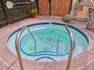 a small swimming pool with a slide in a backyard at Pacific Plaza #304 - Condo on the Coastline - 1BdrmD-K-QSofa in Oceano