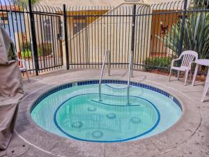 a small swimming pool in the middle of a yard at Pacific Plaza #304 - Condo on the Coastline - 1BdrmD-K-QSofa in Oceano +21 photos