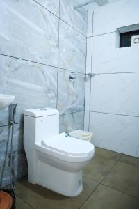 Ένα μπάνιο στο Thazhvaram Homestay