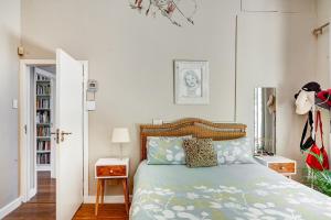 Ένα ή περισσότερα κρεβάτια σε δωμάτιο στο Llandudno penthouse apartment +24 φωτογραφίες