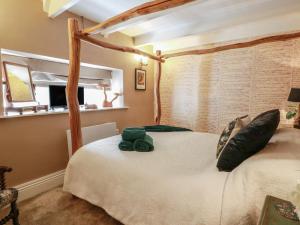 Postel nebo postele na pokoji v ubytování Rowantree Cottage