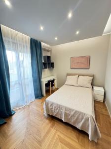 Postel nebo postele na pokoji v ubytování Olimpus Luxury Stays
