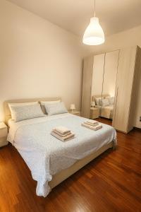 Postel nebo postele na pokoji v ubytování CasaSofia Apt - Naples, Fuorigrotta