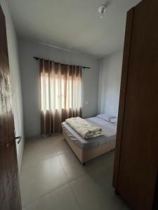 Ένα ή περισσότερα κρεβάτια σε δωμάτιο στο Casa Verde