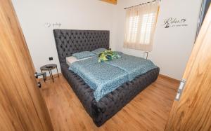 Postel nebo postele na pokoji v ubytování RANČ Dida