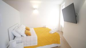 a model of a bedroom with a bed and a tv at Sky House Sant'Orsola in Bergamo