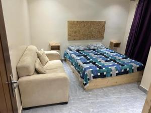 Postel nebo postele na pokoji v ubytování Dakar Yoff virage