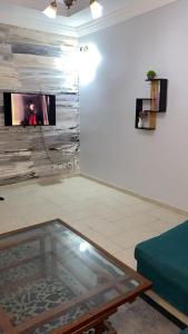 TV a/nebo společenská místnost v ubytování Dakar Yoff virage