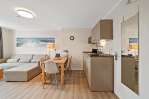 Kuchyň nebo kuchyňský kout v ubytování SNOWFLAKE Zentrale Lage Bikepark & Piste